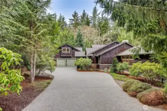 Located at the end of the cul-de-sac, this home provides ample space for living.