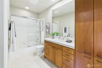 The en-suite bath private to the additional main floor bedroom.