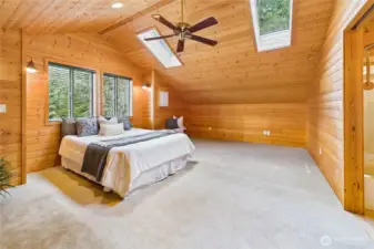 Bedroom #2 above the garage. When touring, note the extensive unfinished storage space that opens into this room, perfect for converting to closet or finished storage space.