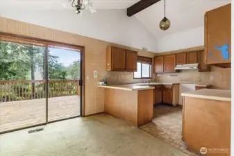 Dining area that leads out to the large deck.