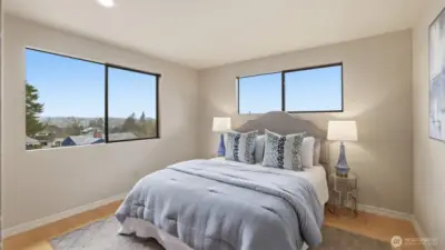 Bright and inviting bedroom with good natural light.