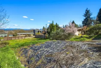 Ground shot showing potential driveway access and build orientation