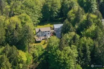 This property is perched at the top of a hill on 2.45 pretty acres.