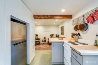 Downstairs Apt, Full Eat in Kitchen looking out towards Den. Soft colors, so Relaxing!