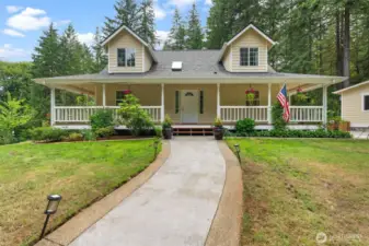 Custom-built Craftsman with wraparound covered deck