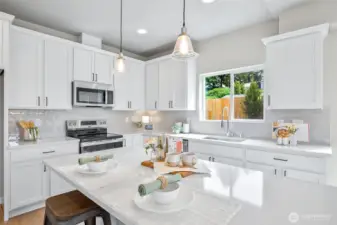 Photographs are for illustrative purposes only. Features, finishes, interior/exterior colors, landscaping and floorplan shown may vary from actual homes built.