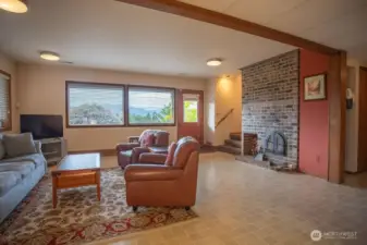 basement with fireplace and second bedroom