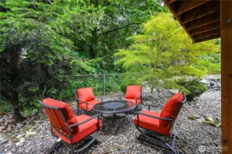 Tranquil setting with privacy and mature trees.