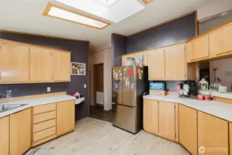 Entry to the kitchen That door leads to the utility room
