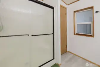 New shower door. Linen closet to the right
