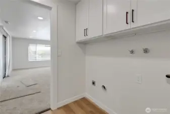 Handy laundry area off family room and kitchen
