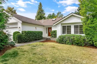 Enjoy full sun in the private landscaped front yard.