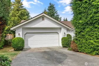Plenty of parking with a two car garage and generous driveway space.