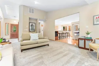 Open and inviting kitchen/living/dining room floor plan.
