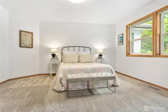 Plenty of space in this primary bedroom for queen and king sized beds.