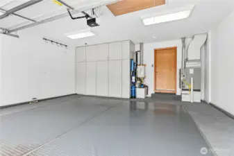 Fully finished garage with built in storage.