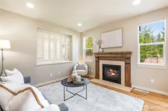Cozy family room centered around a gas fireplace.