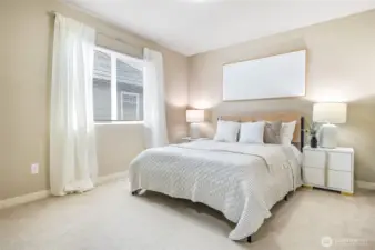 Sunlit additional bedroom.
