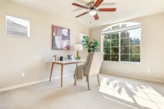 Sunlit additional bedroom could be used as an office.