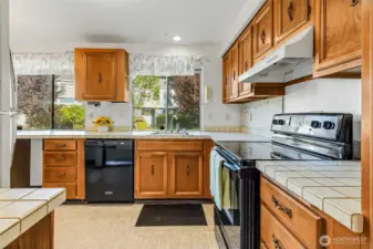Kitchen has plenty of cabinets & counter space