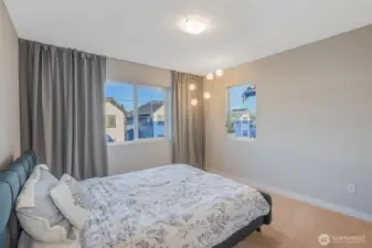 Third bedroom is a corner room with additional windows.