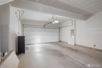 Deep two bay garage with storage space.
