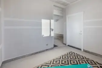 Flex room with access to the covered patio.