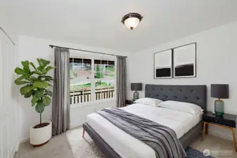 Bedroom on main floor staged