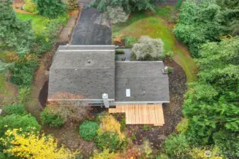 Aerial view of back of house with new deck.