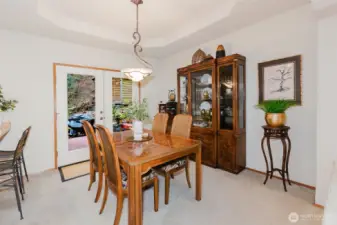 Dining room with door to back deck and yard