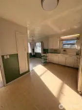 Off of the huge mudroom is a really large kitchen with original era charm still in tact.