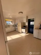 Completely usable in its current form, this kitchen is big enough to reconfigure in whatever form the chef in you desires.  Don't need more kitchen space?  How about a formal dining room or another bedroom?  Space is space.  Walls are walls.  Use your fab design skills to come up with the floorplan that works for you and yours.