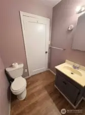 There is a full bath located centrally between the living area and the bedrooms.