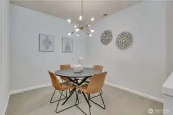Dining room features a stylish mid-century modern Sputnik chandelier.