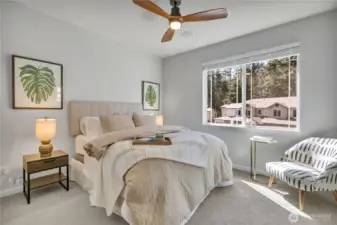 Primary bedroom offers a spacious layout and a large walk-in closet.