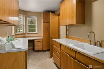 Laundry room + 3/4 bathroom on main level