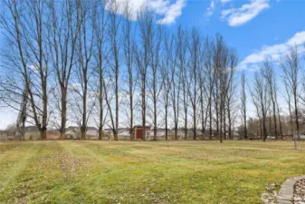 irrigated sprawling lawn + garden areas