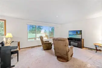 Spacious main living area filled w/ natural light.