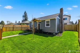 Spacious, fully fenced yard with level lawn