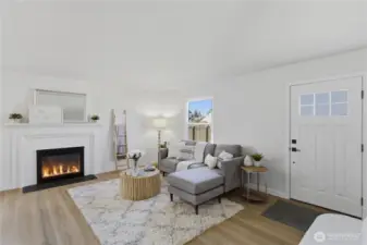 Bright living room with fireplace and natural light