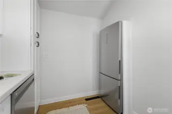 Dedicated kitchen area with efficient layout and storage