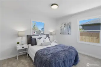 Primary bedroom with natural light and comfortable layout