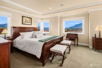 The primary bedroom is a true retreat surrounded by view windows that will take your breath away.