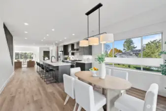 Open dining area and kitchen Island made for entertaining large parties