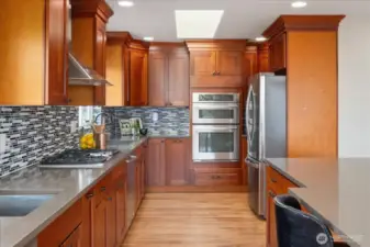 Quality custom wood cabinets, quartz counters and stainless appliances