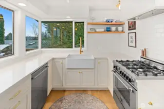 High end stainless steel appliances including a Bertazzoni natural gas range