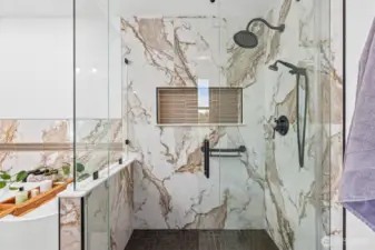 Glass enclosure on walk in shower.