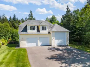 Amazing detached garage with shop, RV port and mother in law studio. Matches architecture of the primary home.