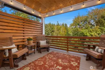 Step outside to a covered trek deck for year-round enjoyment.