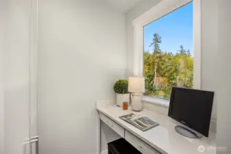 An office space, coffee bar or homework station conveniently located steps from the kitchen.